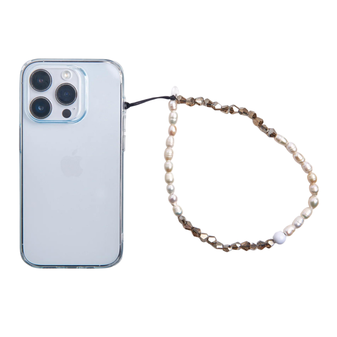 phone charm attached to iphone 14 with pearls and glass crystals
