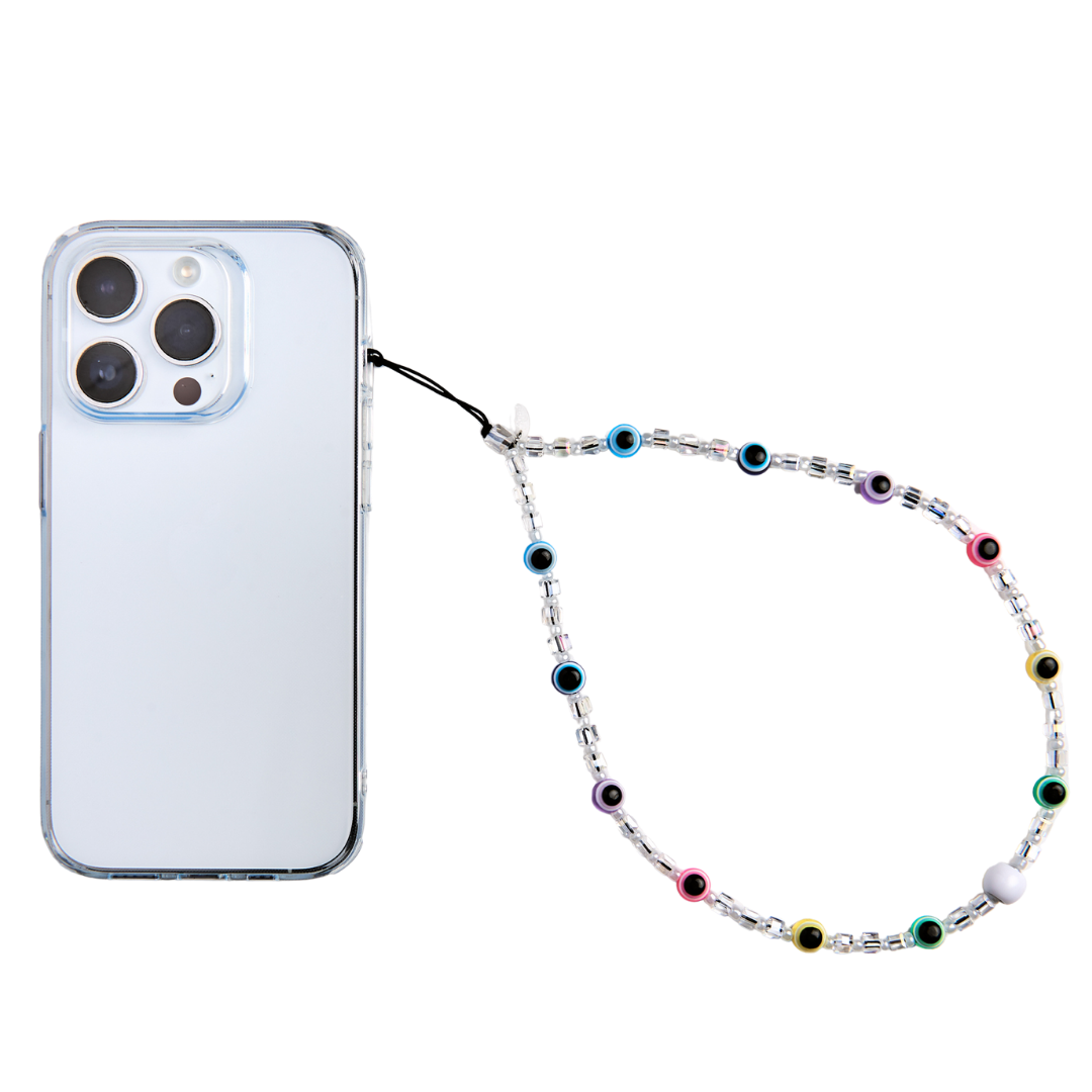 evil eye phone charm attached to phone